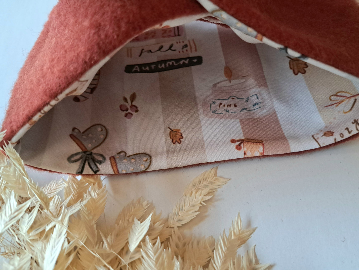 Stirnband Wollfleece 'Virgin Wool' mulesingfrei rost / gestreift